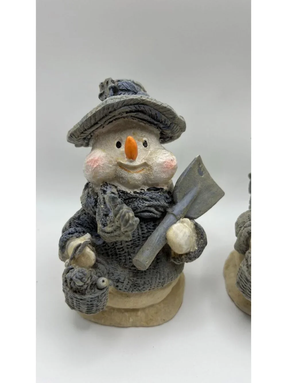 Pair Of Snowman Figurines With Hats & Scarves Holding Shovels Winter Decor